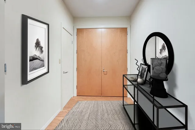 a view of a livingroom with furniture and wooden floor