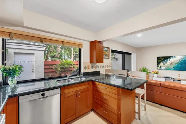 a kitchen with granite countertop lots of counter top space
