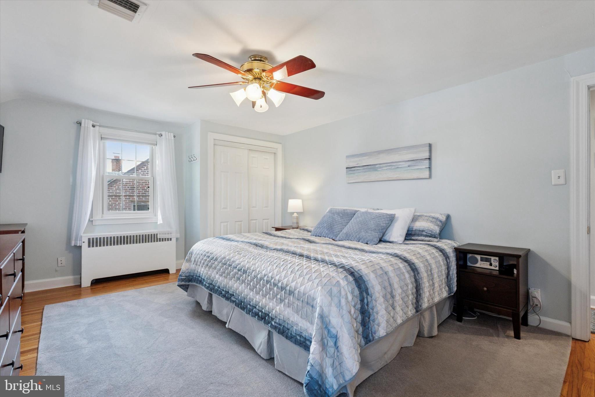141 Friendship Road Drexel Hill, PA 19026 - Photo 18 of 34 a bedroom with a bed and a chandelier
