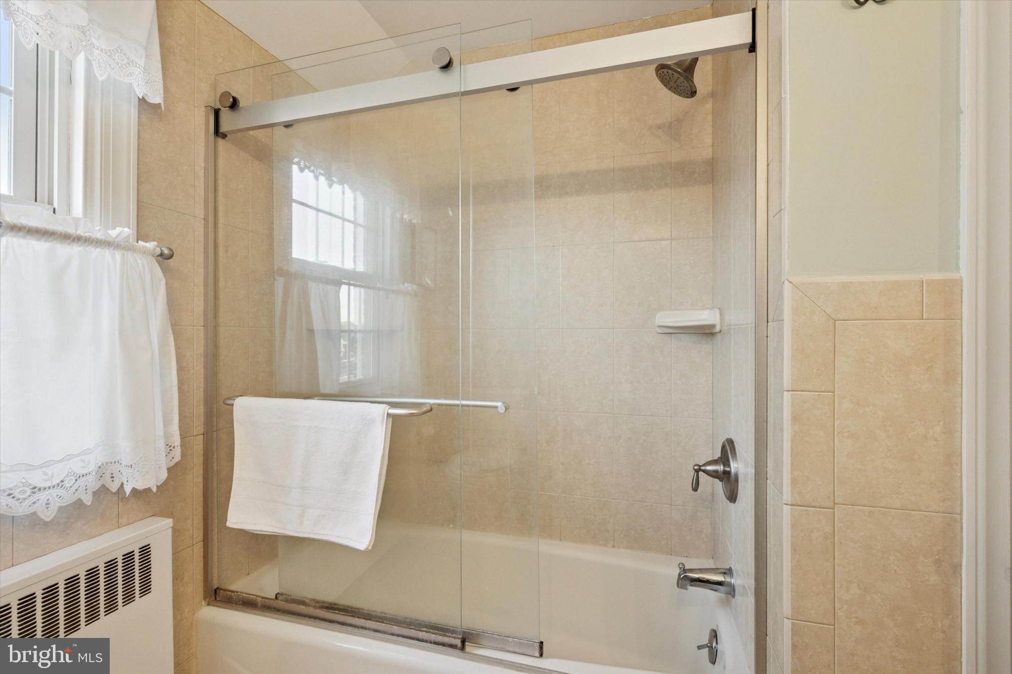 141 Friendship Road Drexel Hill, PA 19026 - Photo 24 of 34 a bathroom with a shower and a tub