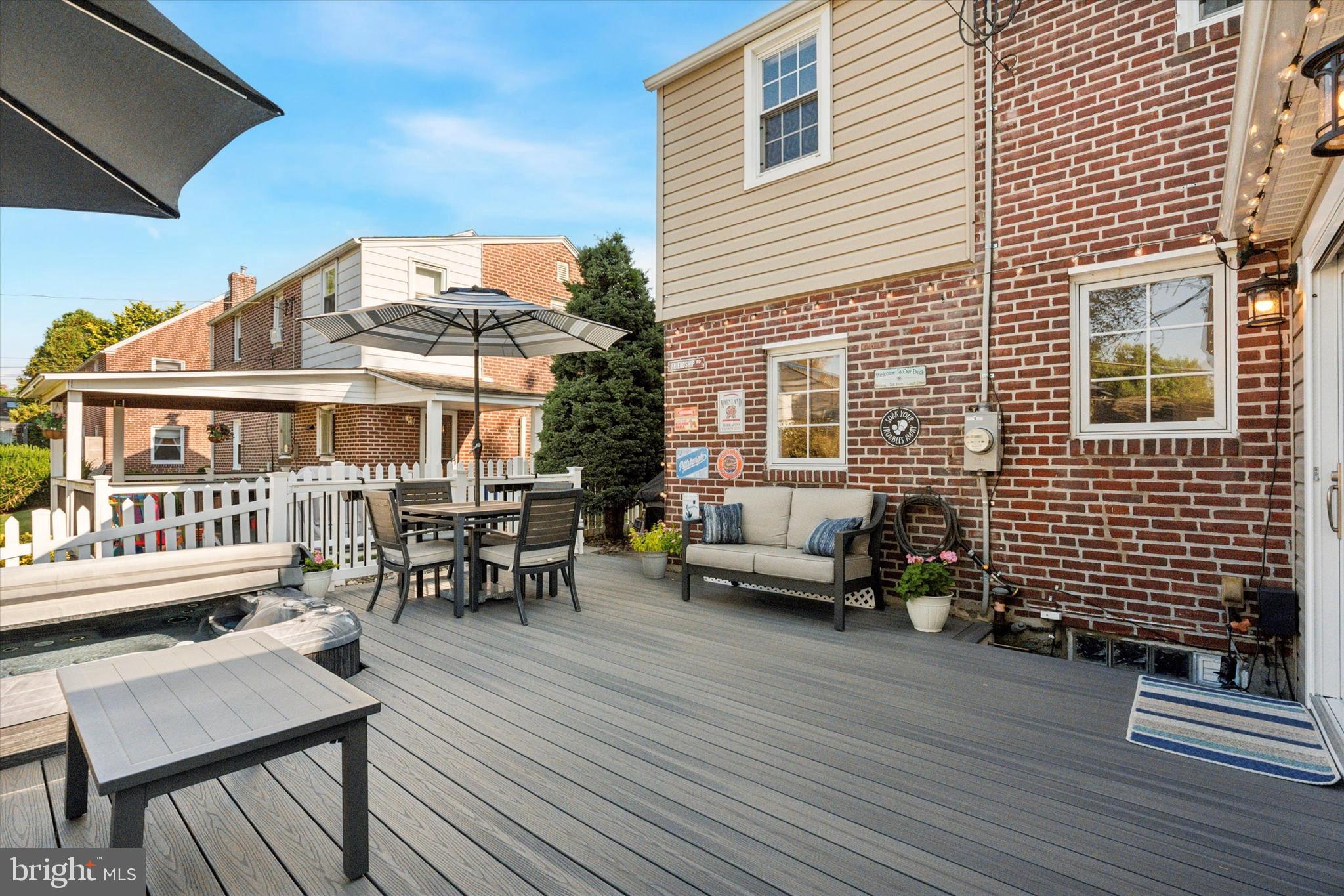 141 Friendship Road Drexel Hill, PA 19026 - Photo 31 of 34 a view of a patio with couches chairs and wooden floor