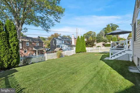 a view of yard and swimming pool
