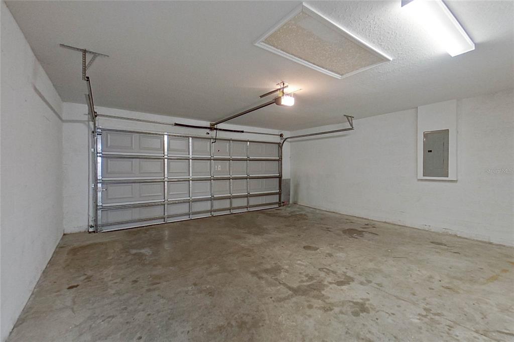 8806 Southwest 135th Street Road Ocala, FL 34473 - Photo 19 of 20 a view of an empty garage
