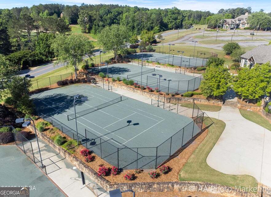106 Forest Place Forsyth, GA 31029 - Photo 4 of 10 an aerial view of a house having swimming pool
