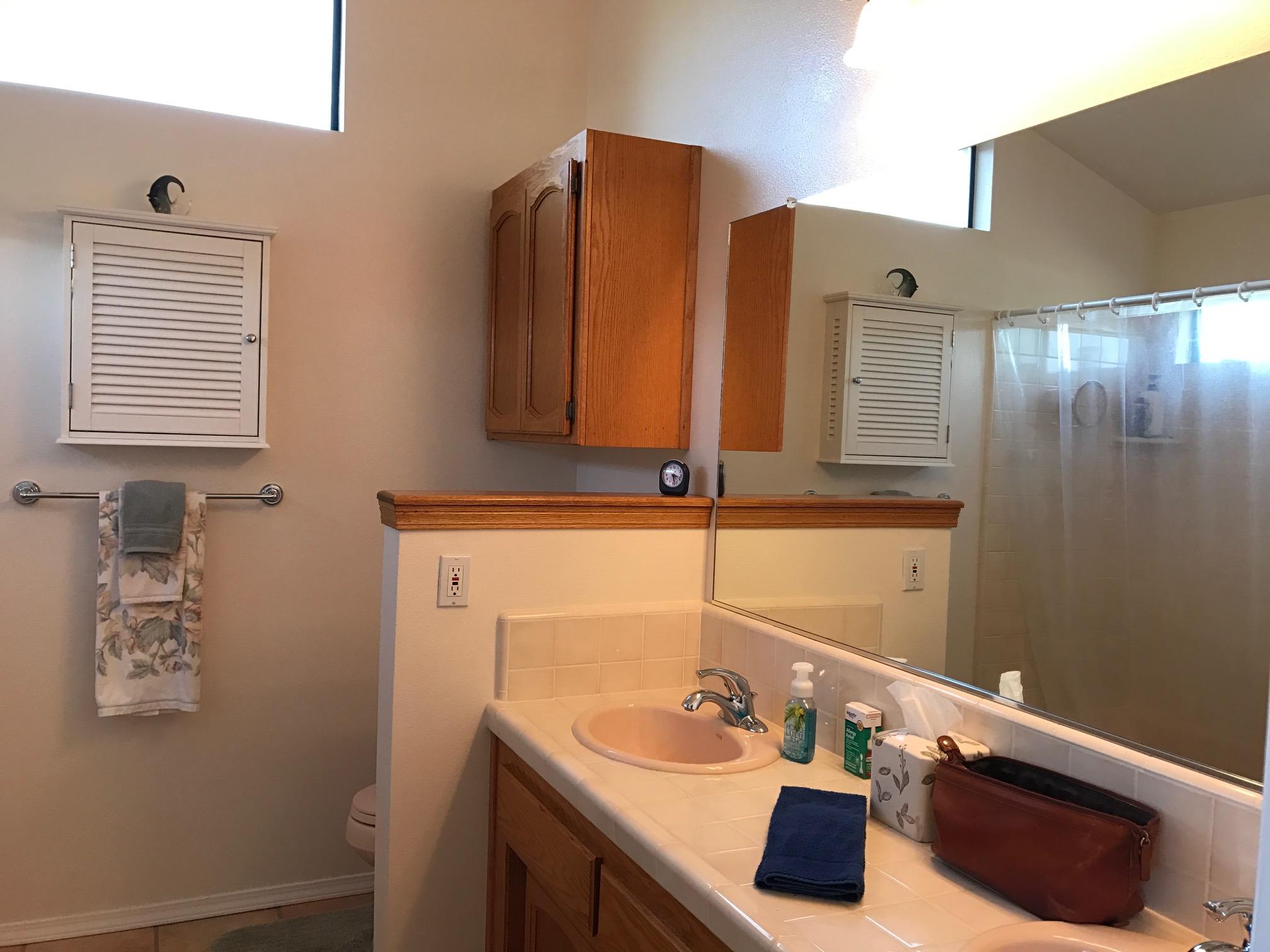 2191 Tularosa Road Lompoc, CA 93436 - Photo 11 of 29 a bathroom with a sink and a mirror