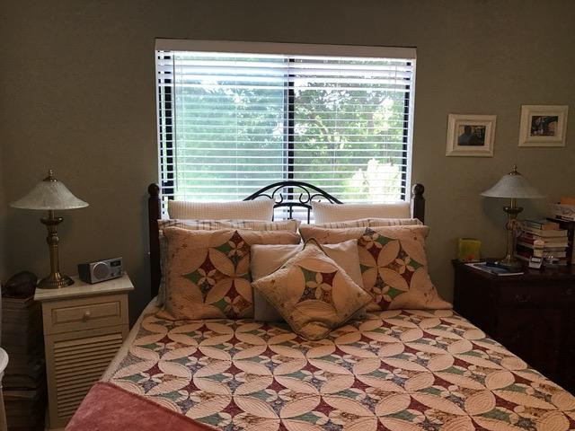 2191 Tularosa Road Lompoc, CA 93436 - Photo 12 of 29 a bed sitting in a bedroom next to a window