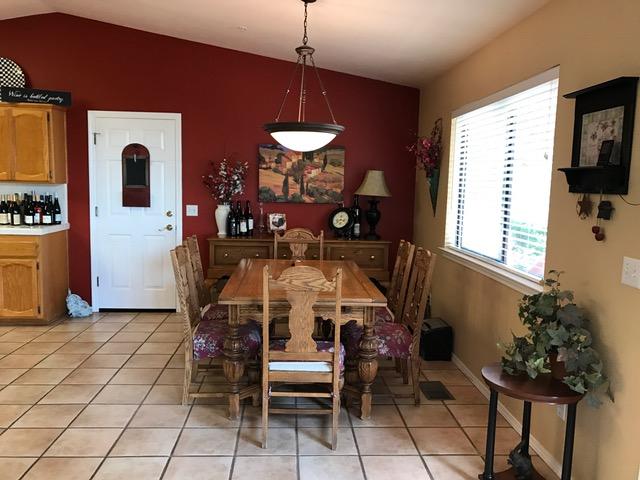 2191 Tularosa Road Lompoc, CA 93436 - Photo 7 of 29 a view of a dining room with furniture and chandelier