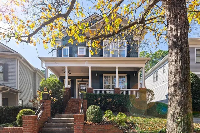 front view of a house with a garden