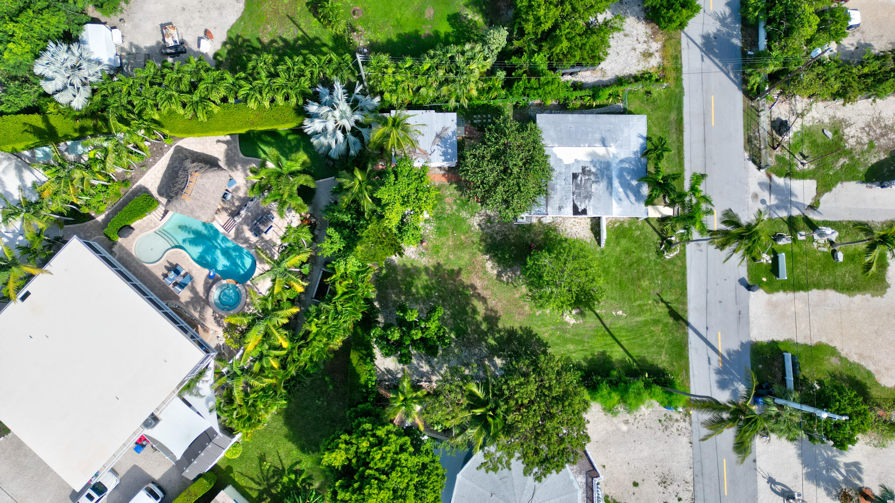15 Seaside Avenue Key Largo, FL 33037 - Photo 19 of 55 an aerial view of a house with a yard and garden