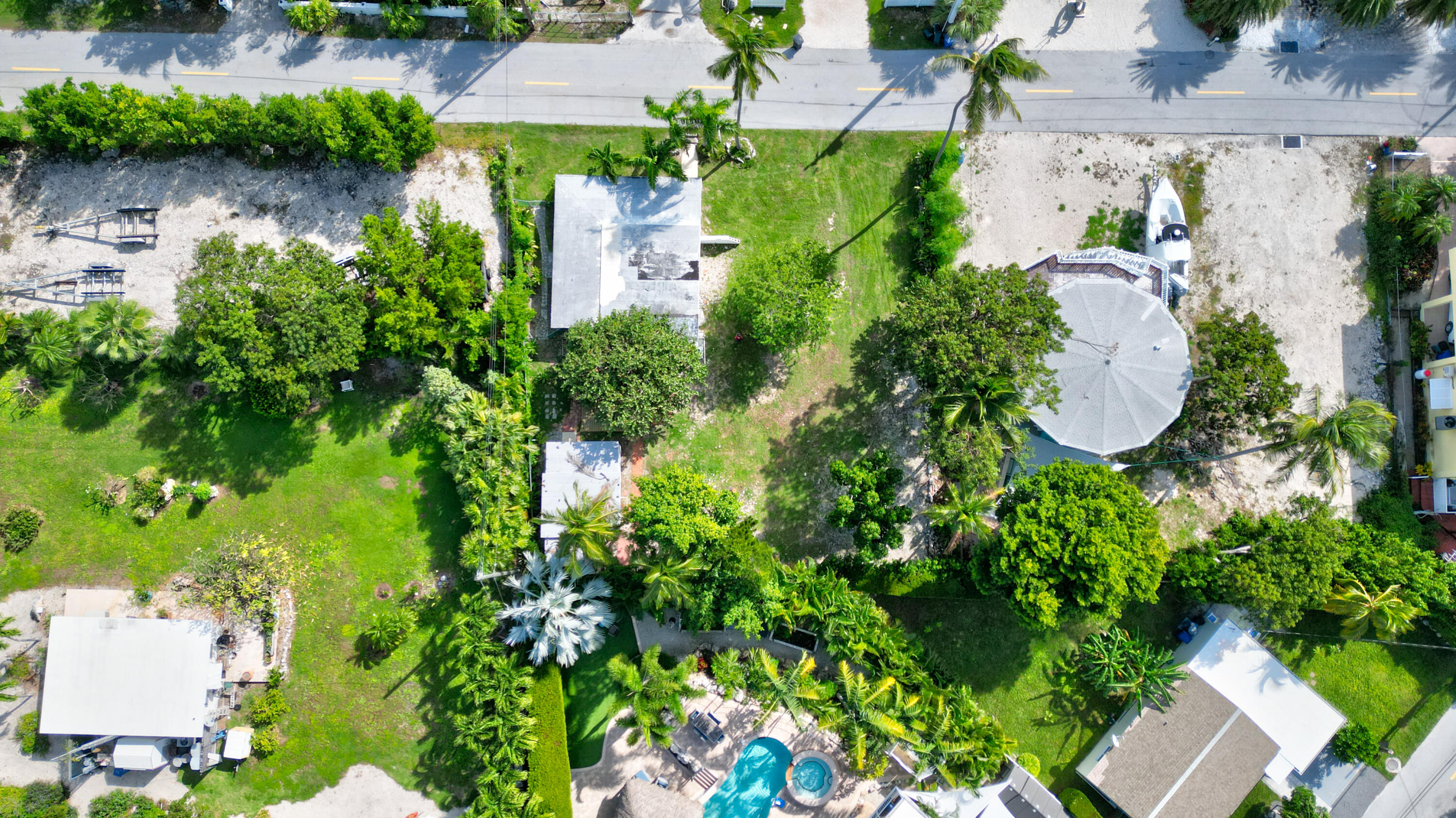 15 Seaside Avenue Key Largo, FL 33037 - Photo 20 of 55 an aerial view of a house with a yard and garden
