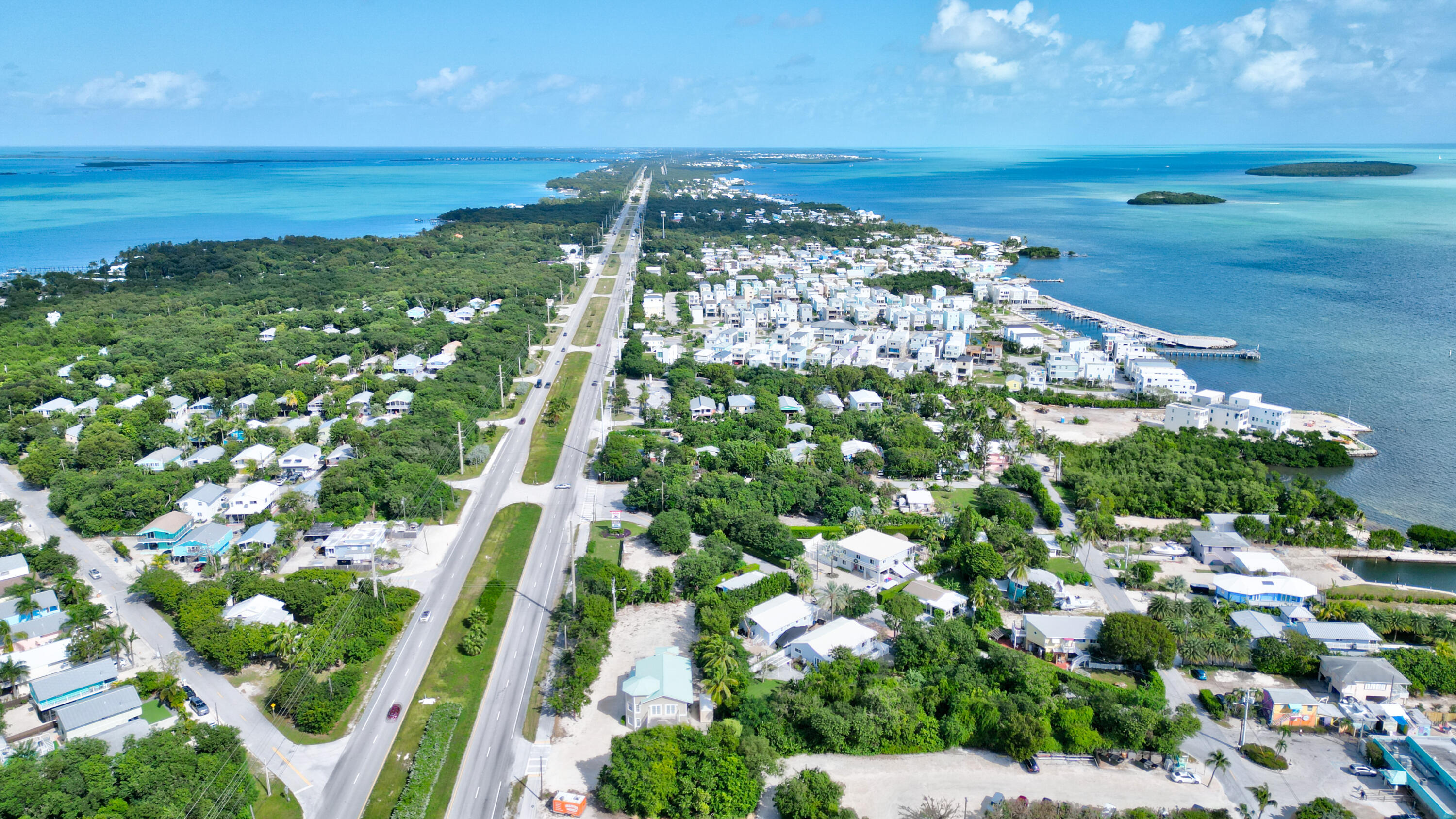 15 Seaside Avenue Key Largo, FL 33037 - Photo 23 of 55 a view of a lake with a city