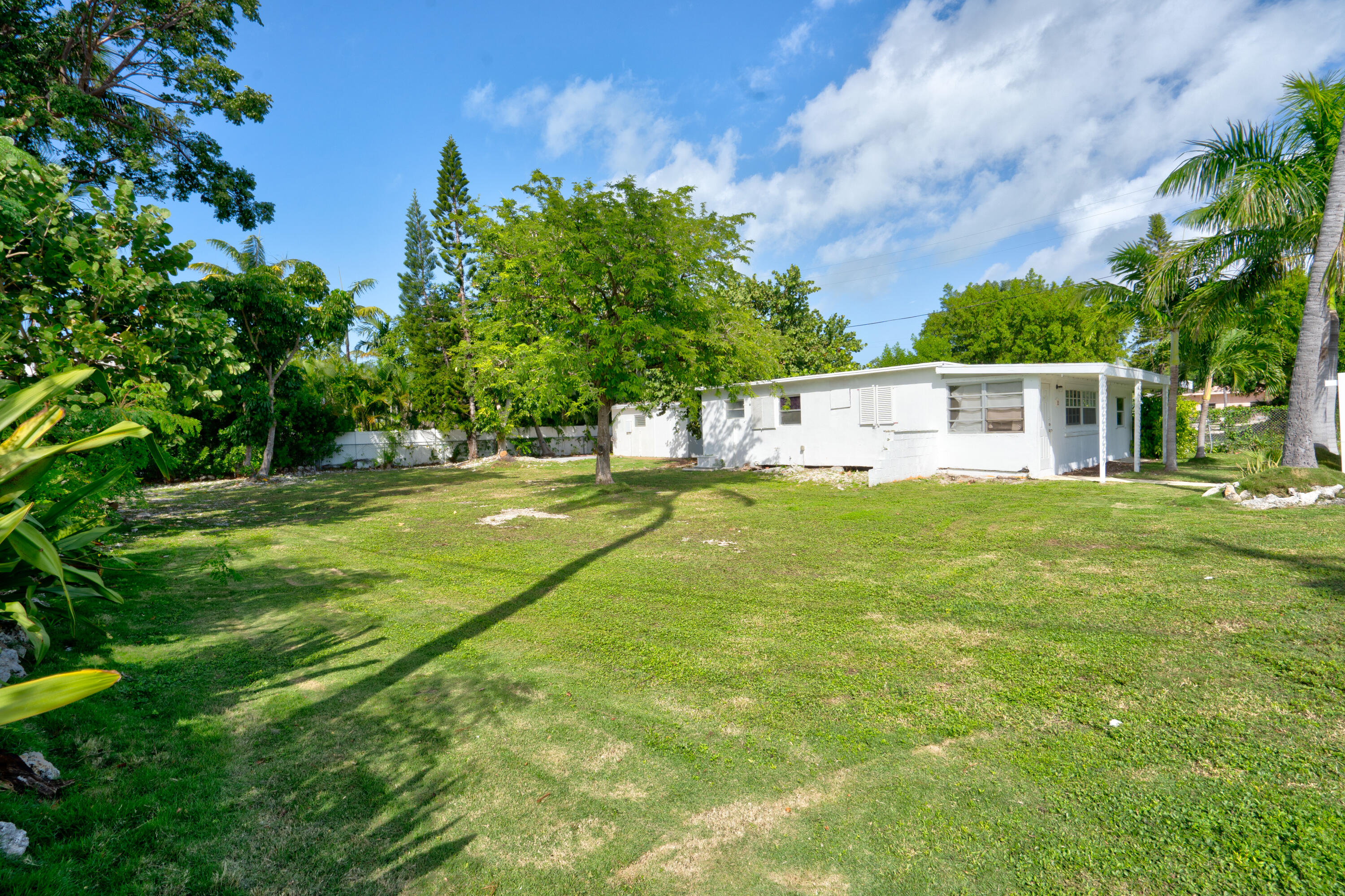 15 Seaside Avenue Key Largo, FL 33037 - Photo 35 of 55 a view of yard with swimming pool and green space