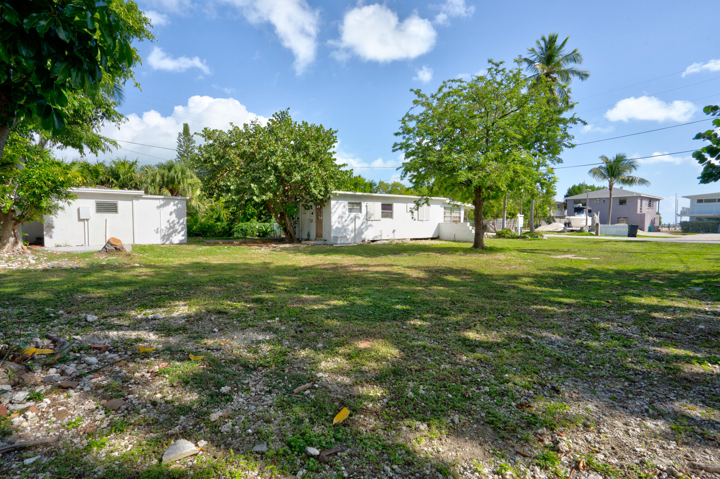 15 Seaside Avenue Key Largo, FL 33037 - Photo 5 of 55 a view of a house with a big yard