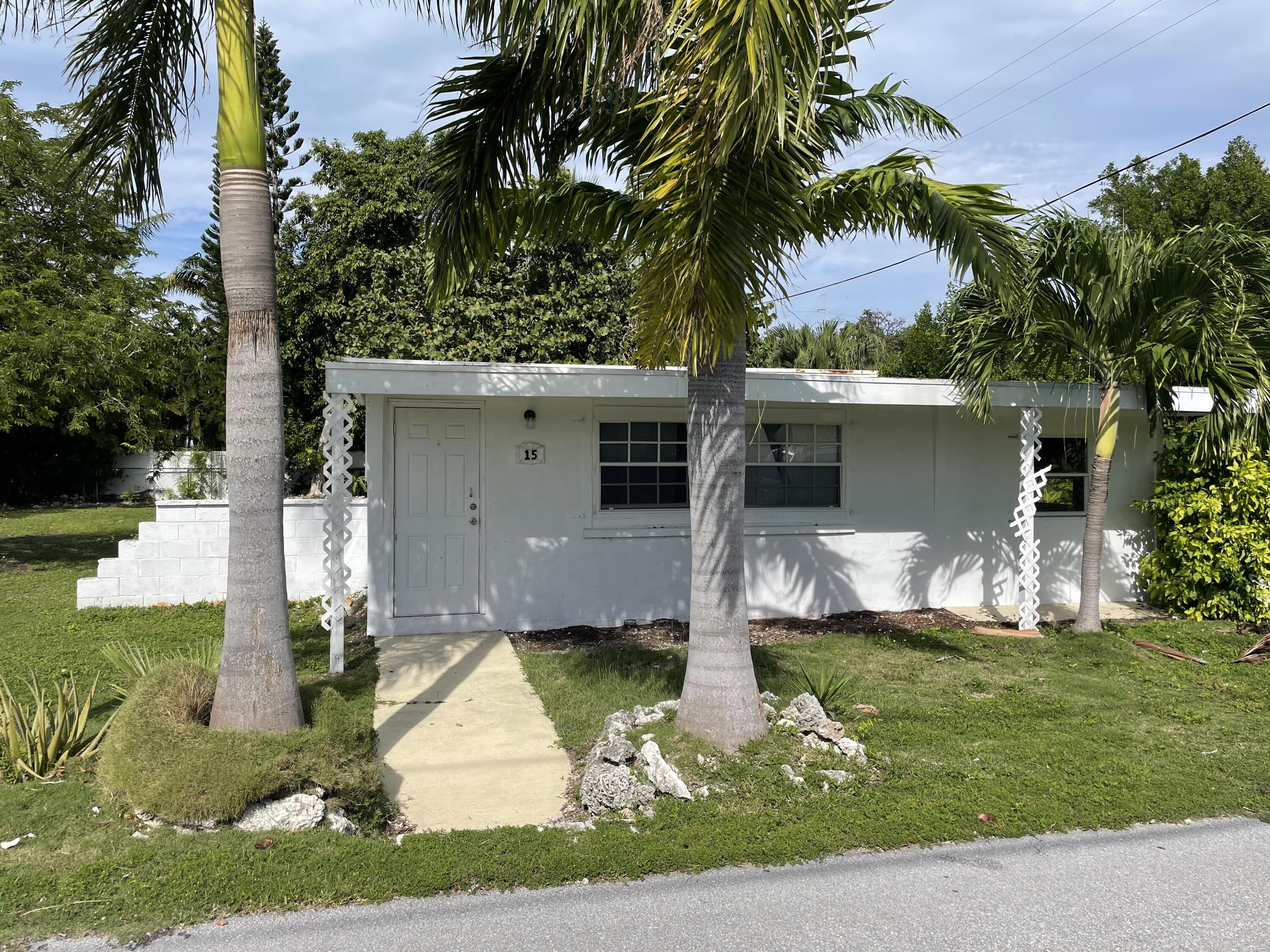 15 Seaside Avenue Key Largo, FL 33037 - Photo 8 of 55 a front view of house with yard and green space