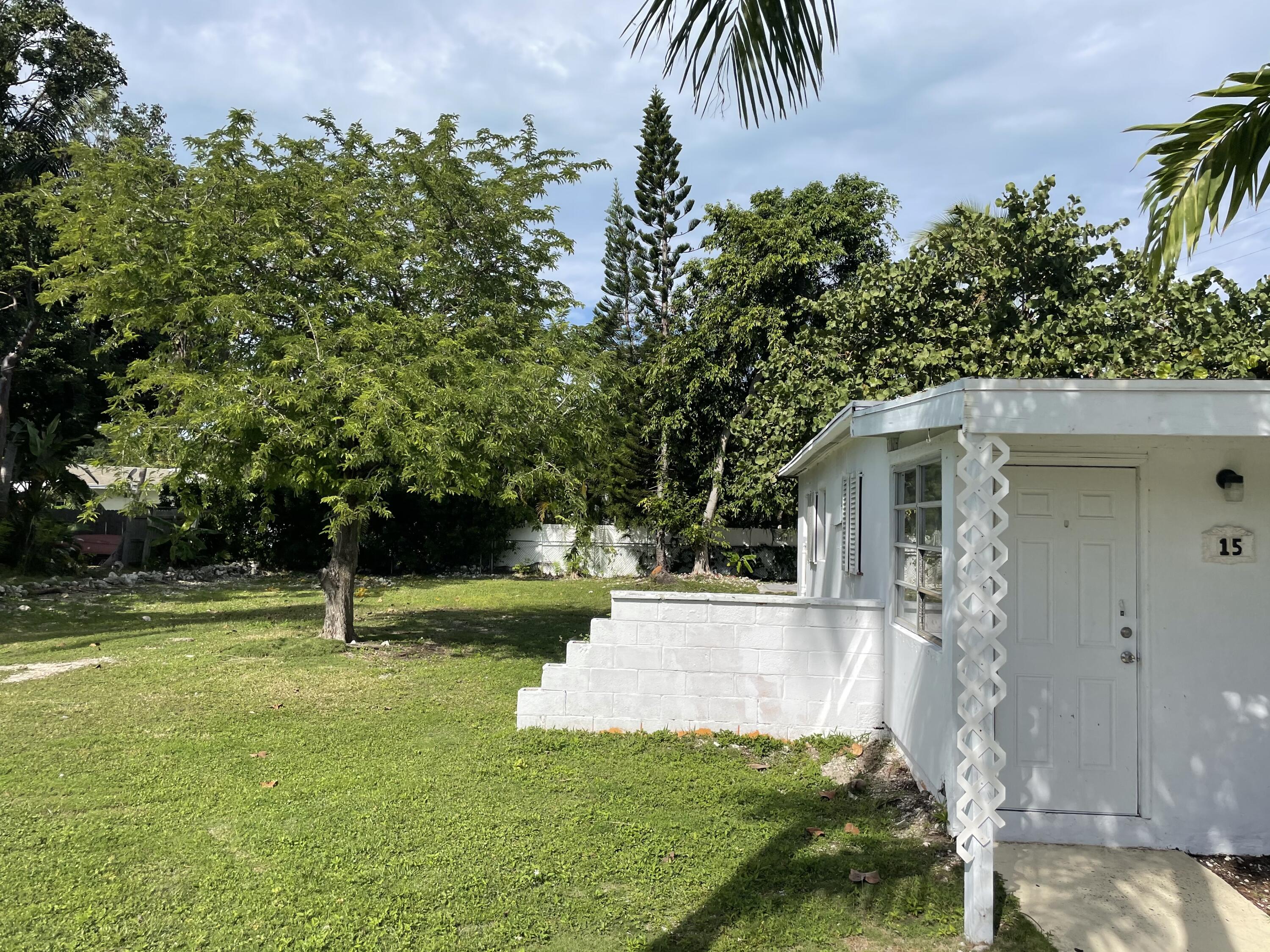 15 Seaside Avenue Key Largo, FL 33037 - Photo 9 of 55 a view of a house with a yard