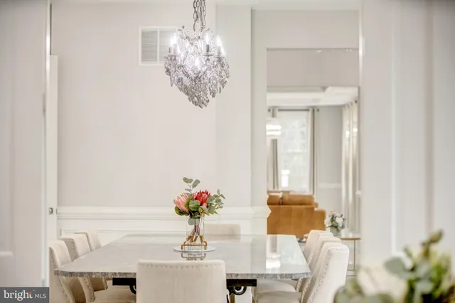 a vase of flowers sitting on a table