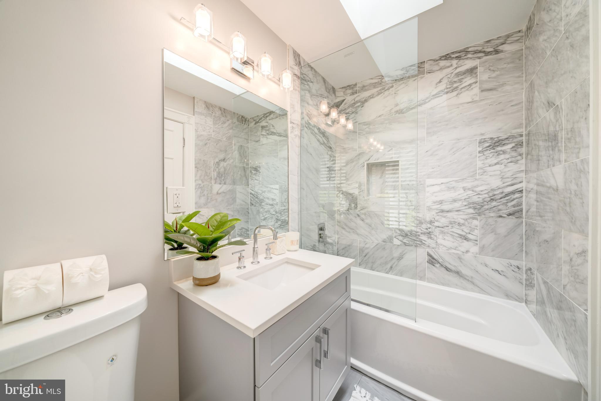 1111 Towlston Road McLean, VA 22102 - Photo 32 of 49 a bathroom with a sink a toilet and a bathtub