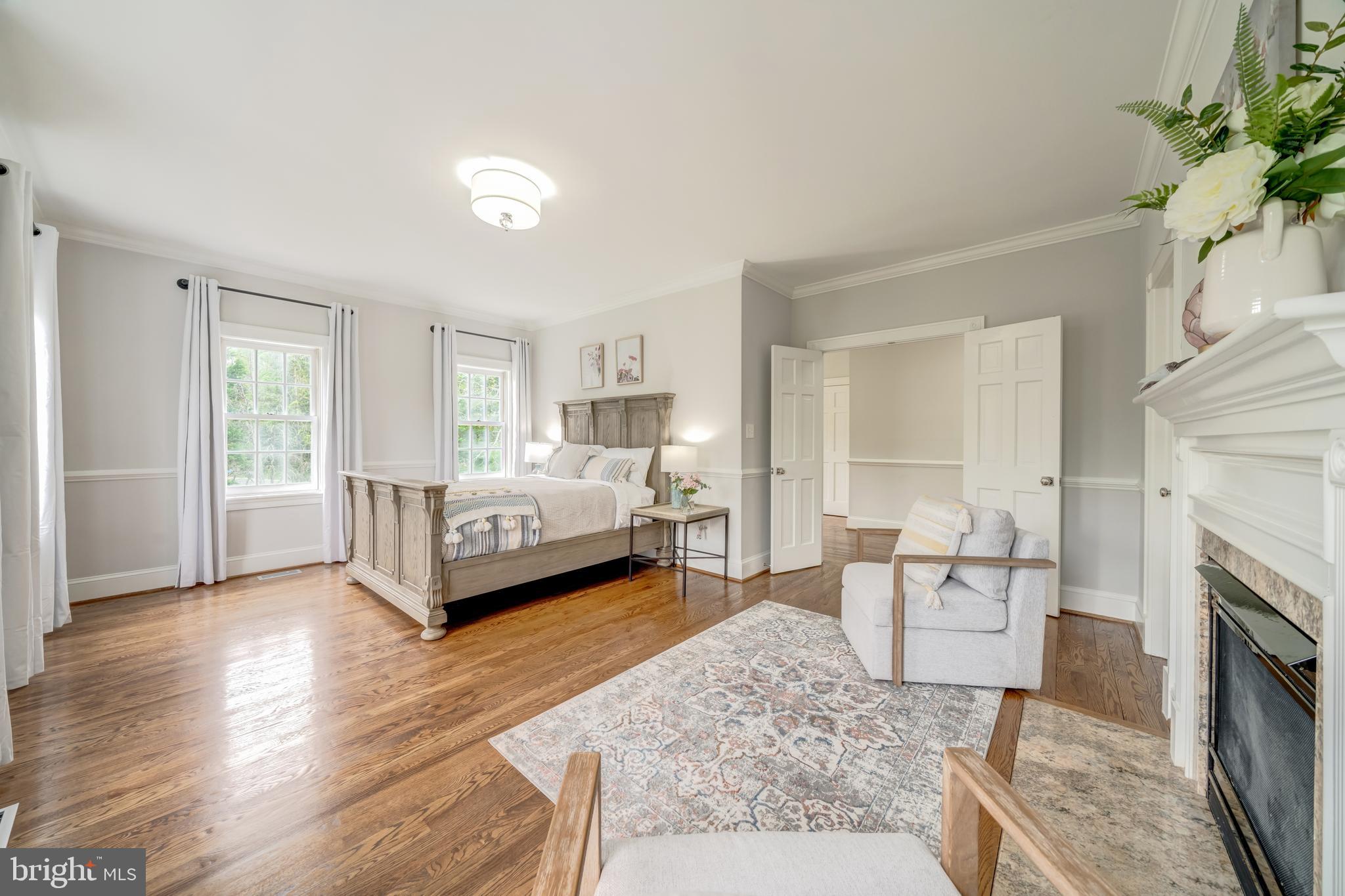 1111 Towlston Road McLean, VA 22102 - Photo 35 of 49 a living room with furniture and a fireplace