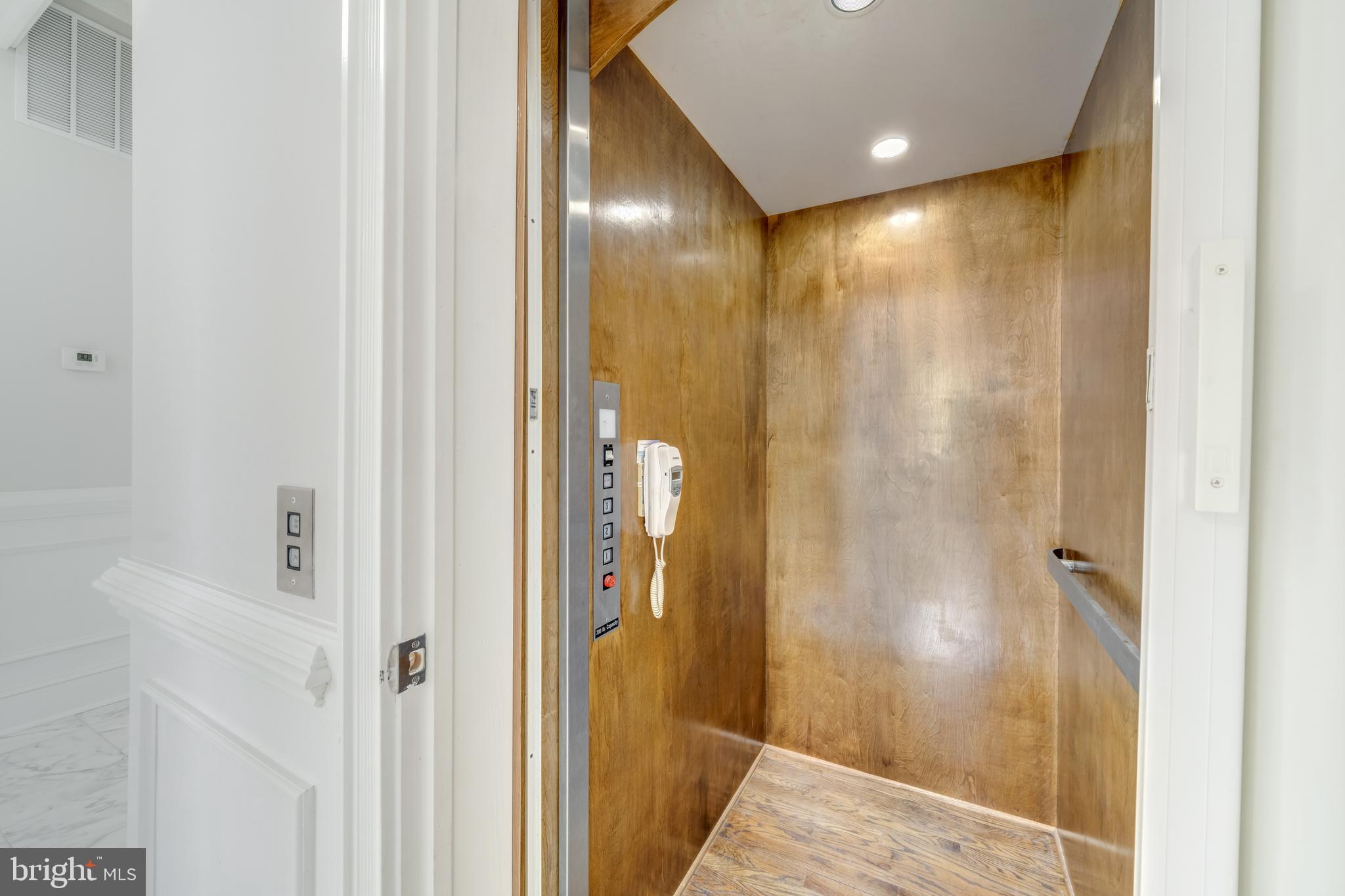 1111 Towlston Road McLean, VA 22102 - Photo 46 of 49 a view of a bathroom from a hallway