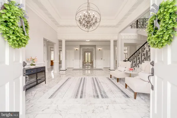 a view of a living room and kitchen view