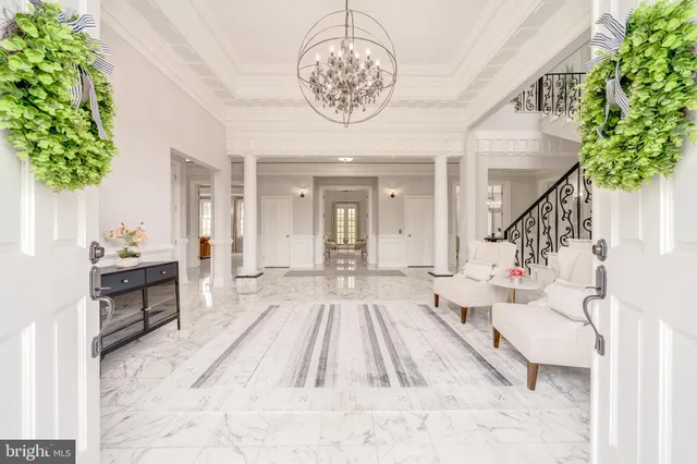 a view of a living room and kitchen view