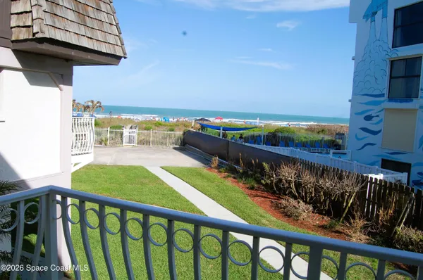 a view of a balcony with an outdoor space