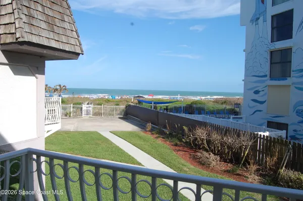 a view of a balcony with an outdoor space