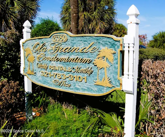 a sign on the side of the road