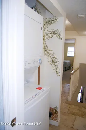 a bathroom with a shower and a sink