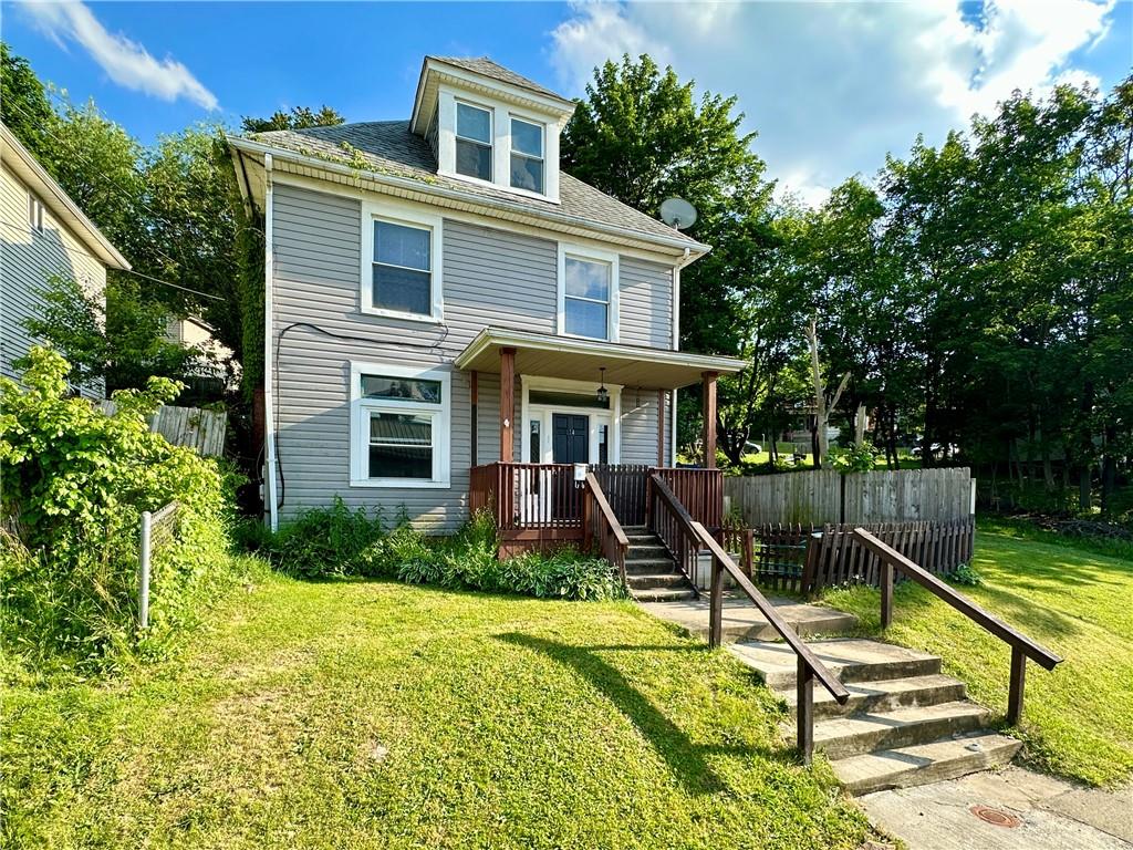 114 South Street Butler, PA 16001 - Photo 1 of 32 a view of a house with a swimming pool and a wooden bench