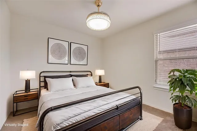 a bathroom with a shower and a glass door