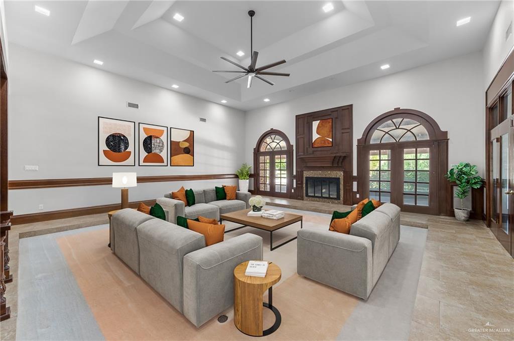 10409 North Ware Road McAllen, TX 78504 - Photo 12 of 45 a living room with fireplace furniture and a large window