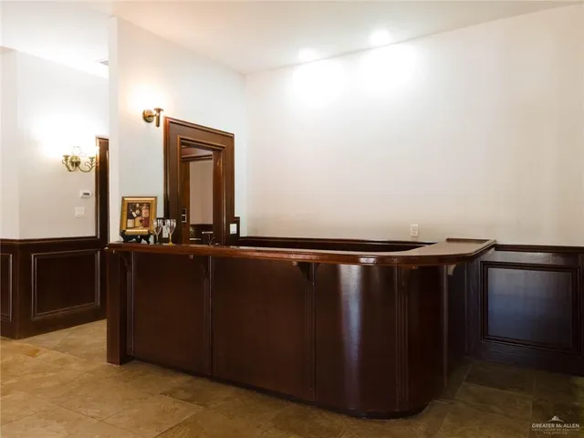 a view of a mirror and cabinets