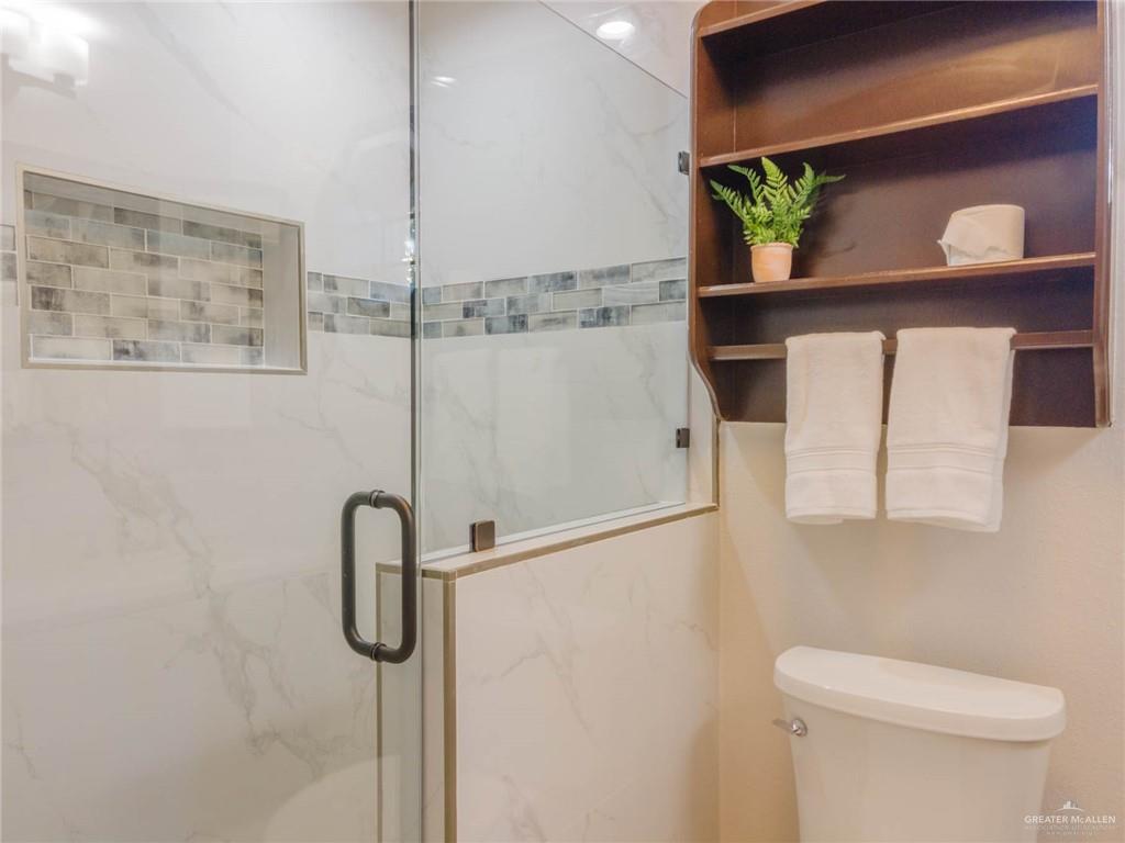 10409 North Ware Road McAllen, TX 78504 - Photo 22 of 45 a bathroom with a shower