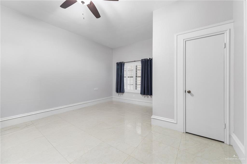 10409 North Ware Road McAllen, TX 78504 - Photo 32 of 45 a view of an empty room with a window