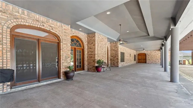 a view of a hallway with glass door