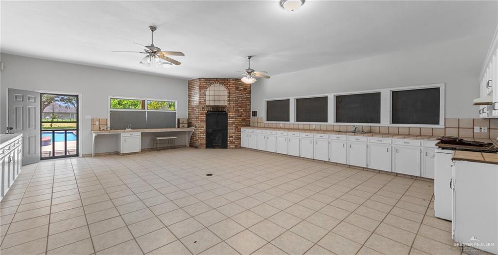 10409 North Ware Road McAllen, TX 78504 - Photo 40 of 45 a large white room with windows and furniture