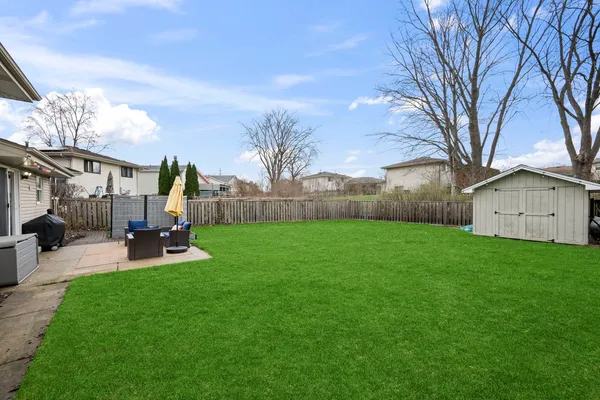 a view of garden with patio