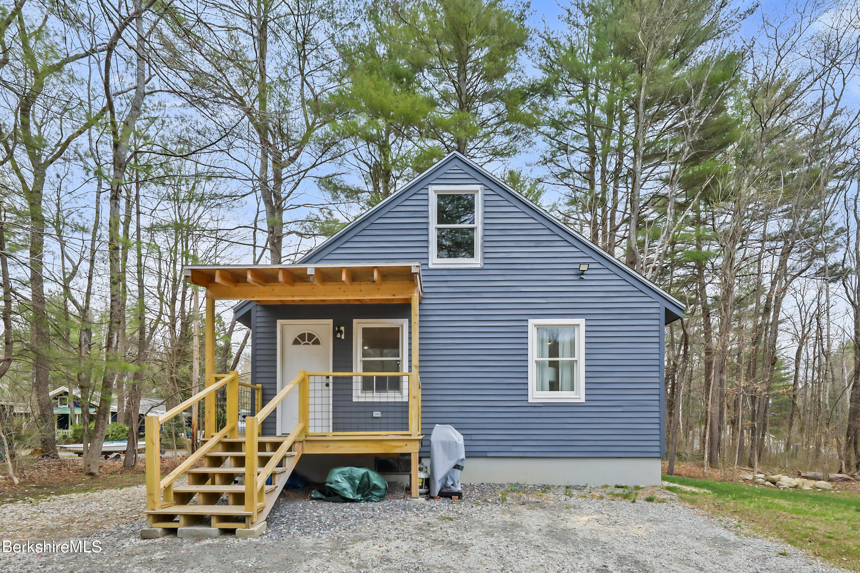 40 Mohekunuk Road Becket, MA 01223 - Photo 3 of 20 a front view of a house with a yard
