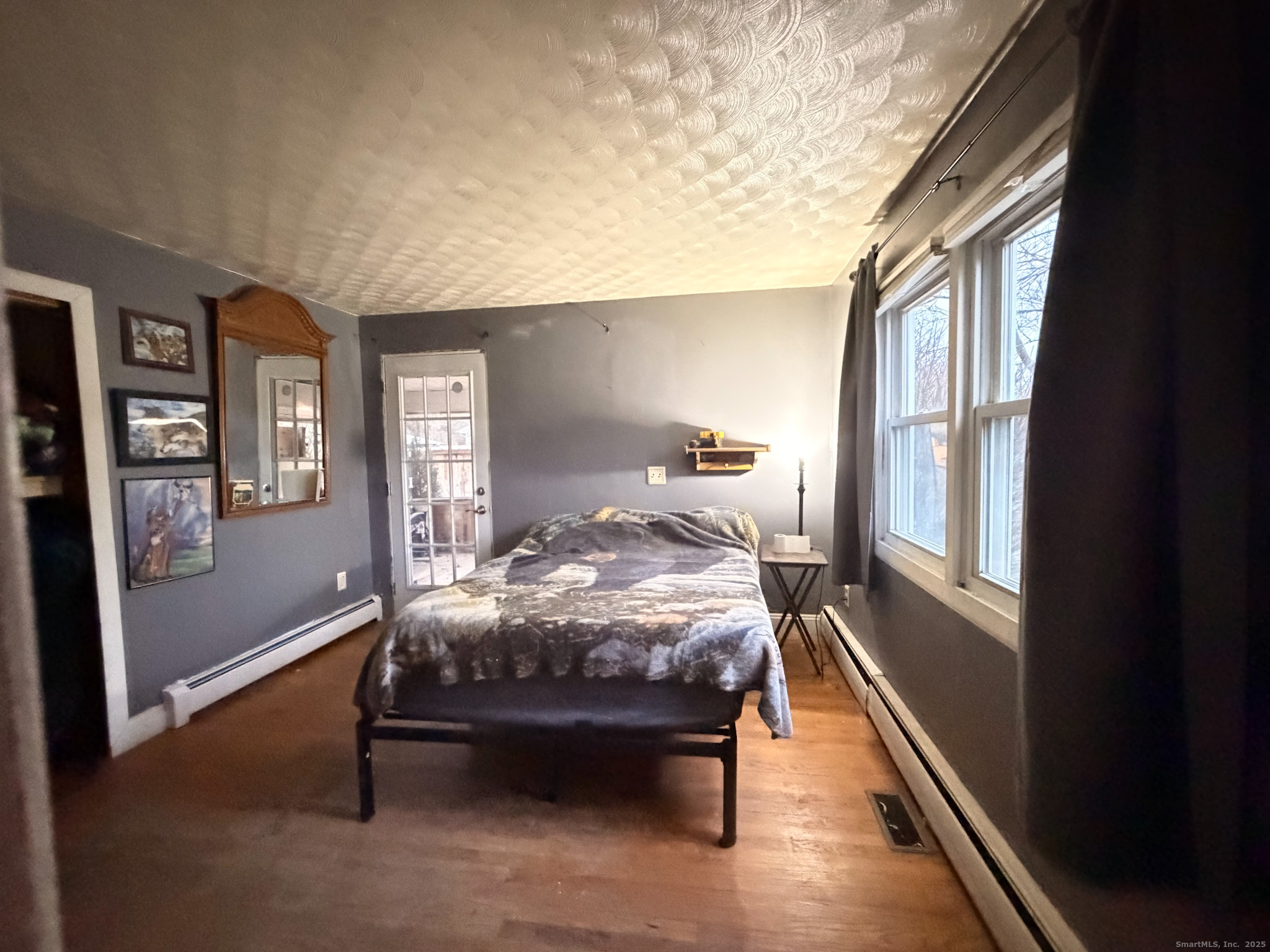 3 Ferland Drive Killingly, CT 06241 - Photo 13 of 19 a bed sitting in a bedroom next to a window
