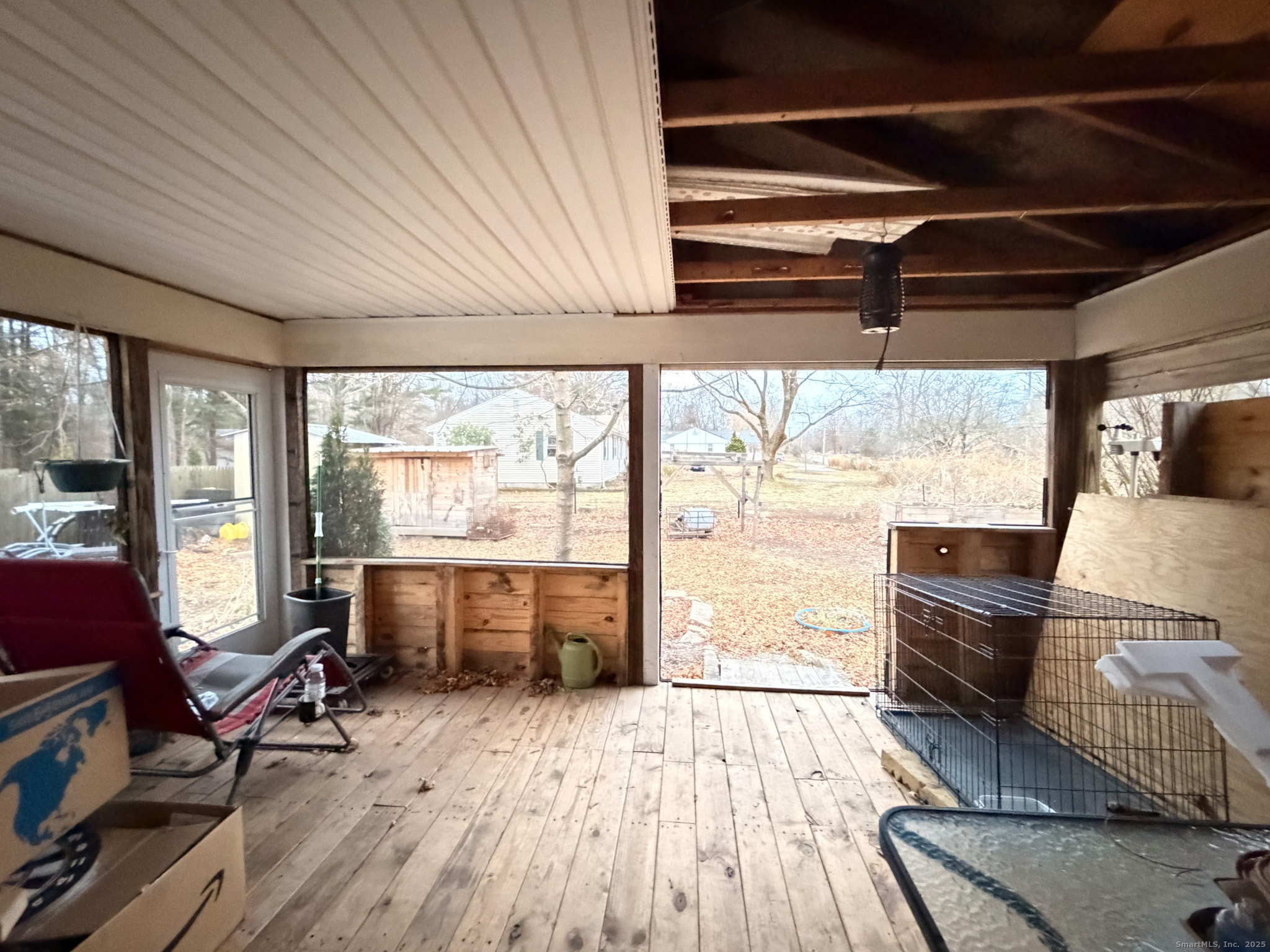 3 Ferland Drive Killingly, CT 06241 - Photo 15 of 19 a room with wooden floors and large windows