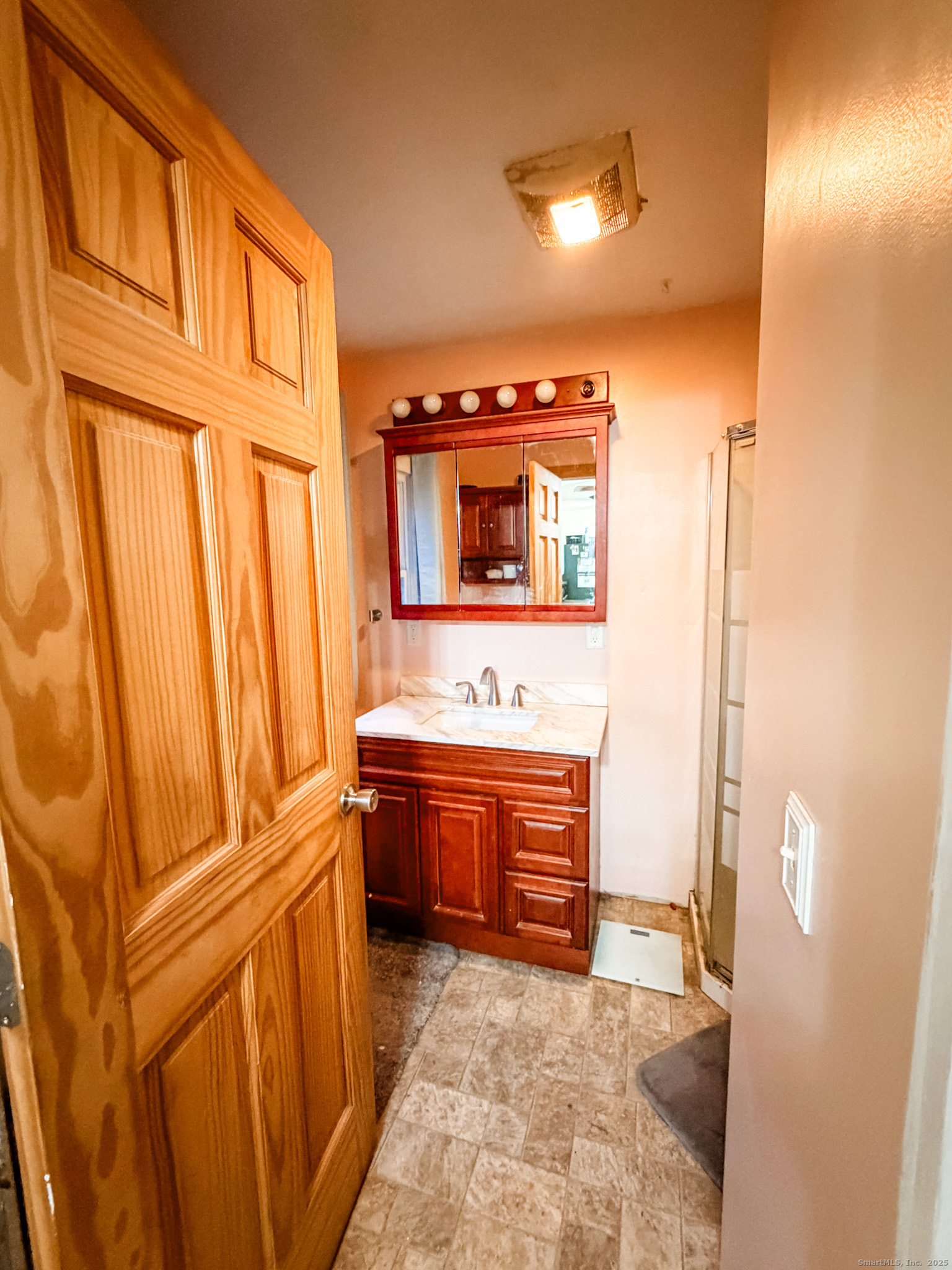 3 Ferland Drive Killingly, CT 06241 - Photo 9 of 19 a bathroom with a sink a bathtub and a mirror