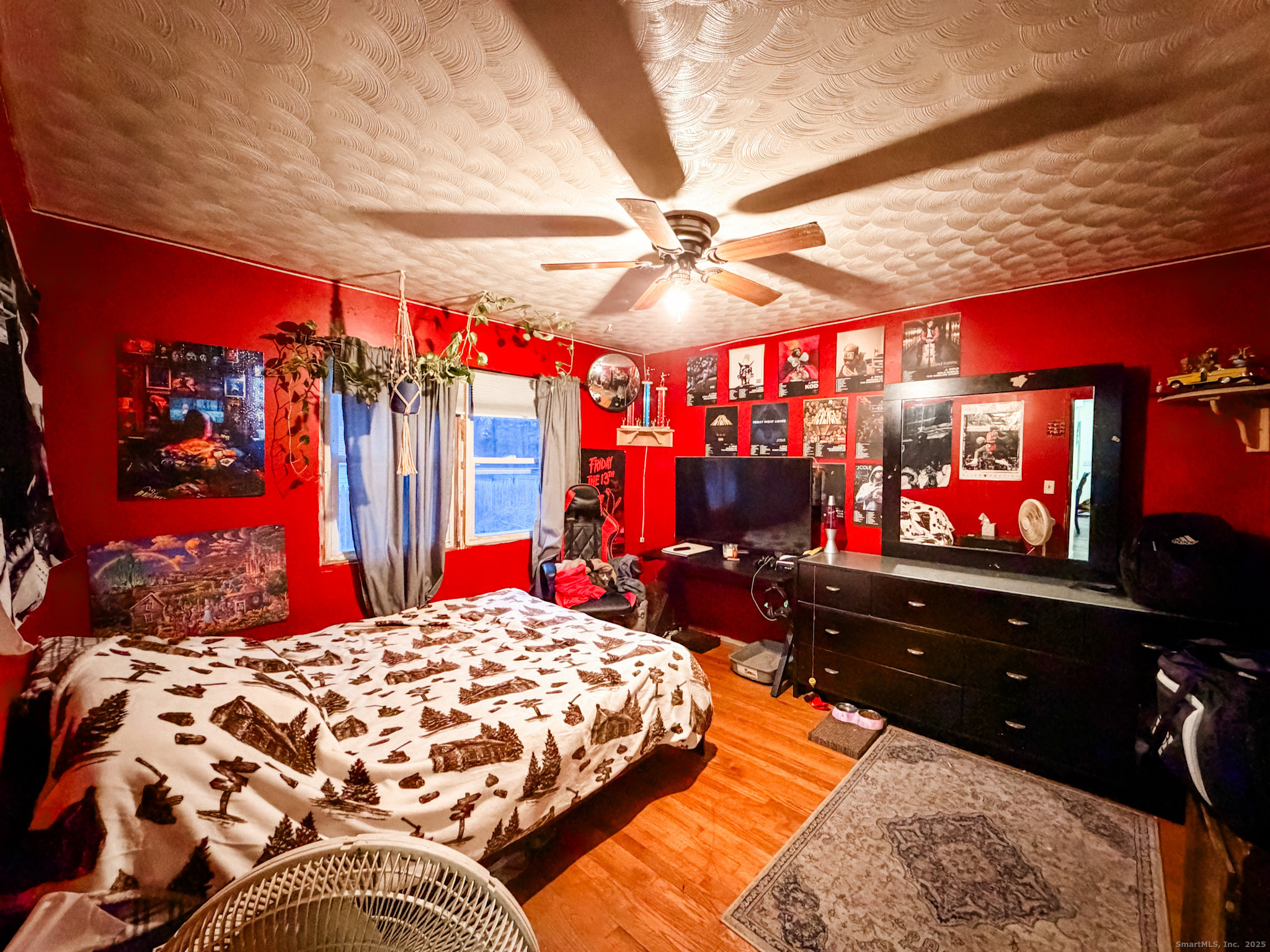 3 Ferland Drive Killingly, CT 06241 - Photo 10 of 19 a bedroom with a bed and a chandelier