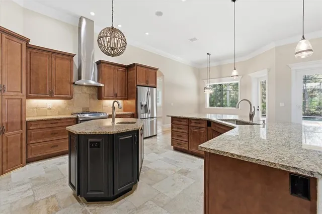 a view of kitchen with furniture and flat screen tv