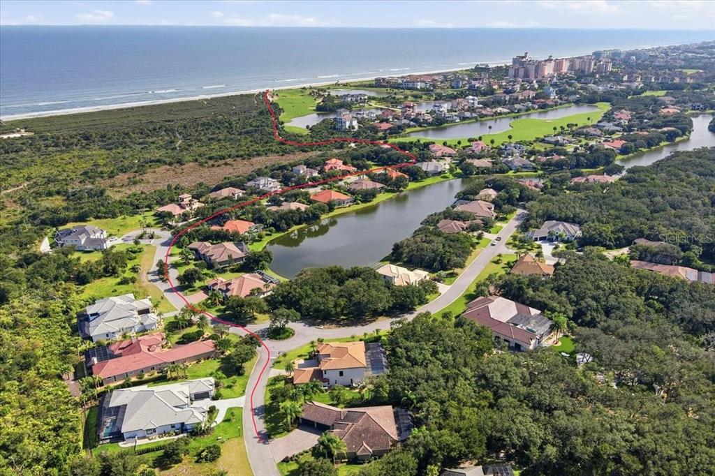 7 Spanish Moss Court Palm Coast, FL 32137 - Photo 2 of 66 an aerial view of residential houses with outdoor space and trees