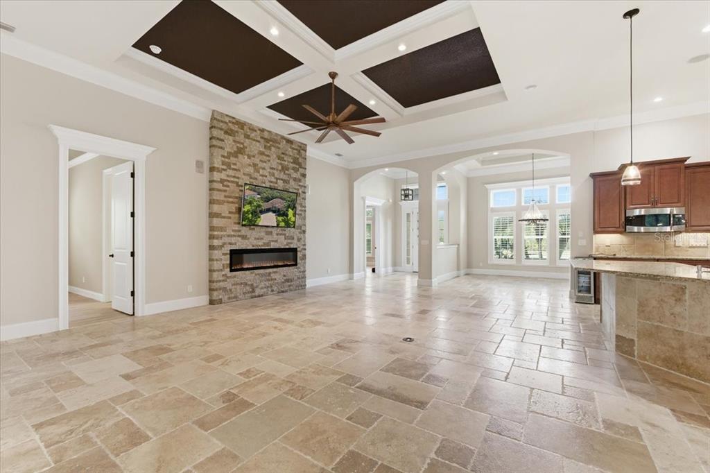 7 Spanish Moss Court Palm Coast, FL 32137 - Photo 21 of 66 a view of kitchen with furniture and flat screen tv