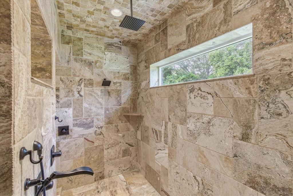 7 Spanish Moss Court Palm Coast, FL 32137 - Photo 29 of 66 a bathroom with a shower