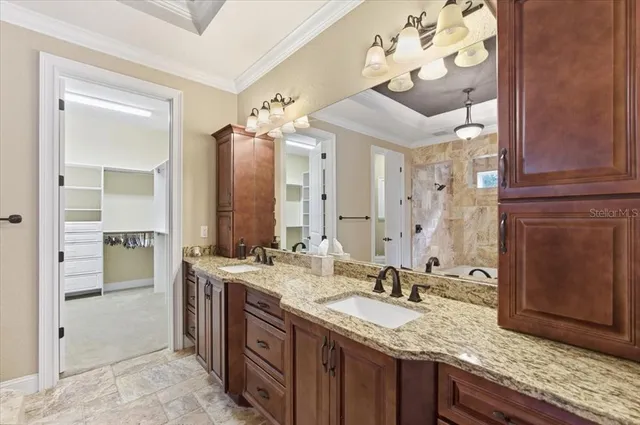 a view of a bathroom with a glass door shower
