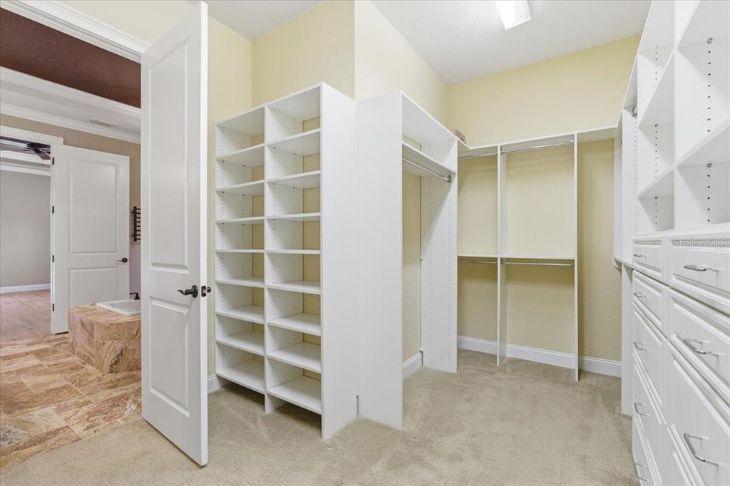 7 Spanish Moss Court Palm Coast, FL 32137 - Photo 32 of 66 a view of an empty room with cabinet and a window