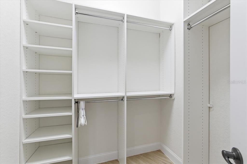 7 Spanish Moss Court Palm Coast, FL 32137 - Photo 38 of 66 a view of an empty walk in closet